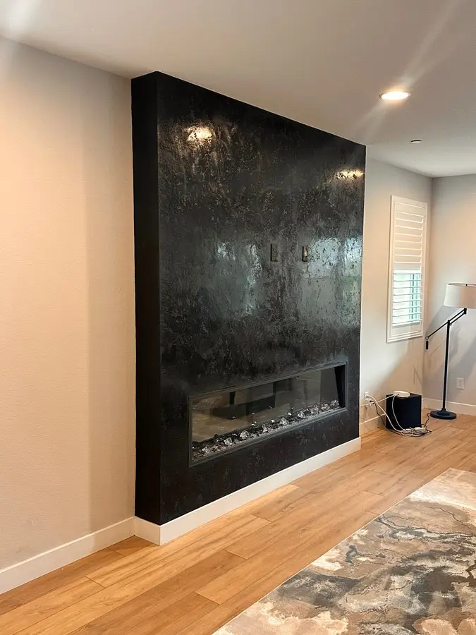 Black mineral plaster · fireplace wall side view, master's work, USA