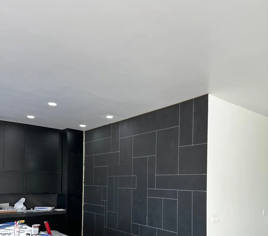 Feature wall with hidden door, master's work