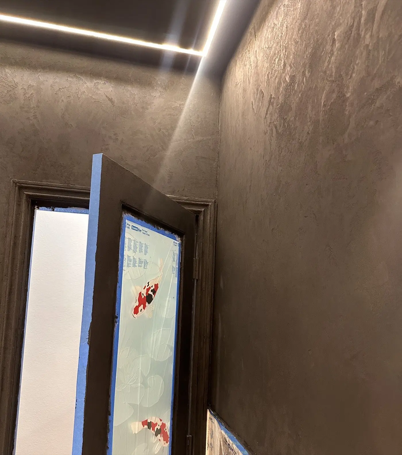 Black Marmorino powder room, master’s work, in progress