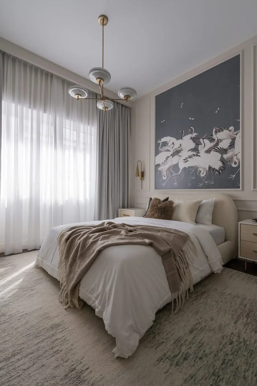 Bedroom with a crane artwork and sheer curtains